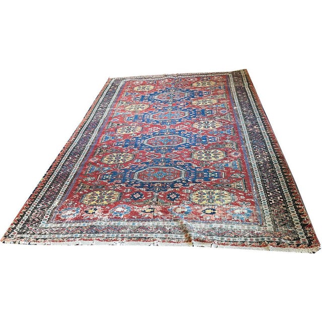 This 19th century Antique Worn Out Distressed Caucasian Kuba Soumak Rug is handmade in Kuba south of the Caucases from...