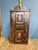 This corner cabinet was made by a country craftsman in the 1850s. It has a simple structure, two doors and a drawer. It...