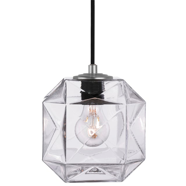 Hand-blown in Venice, Italy, the Mimo Cube pairs mid-century form with old-world glassmaking artistry. Its faceted cube...