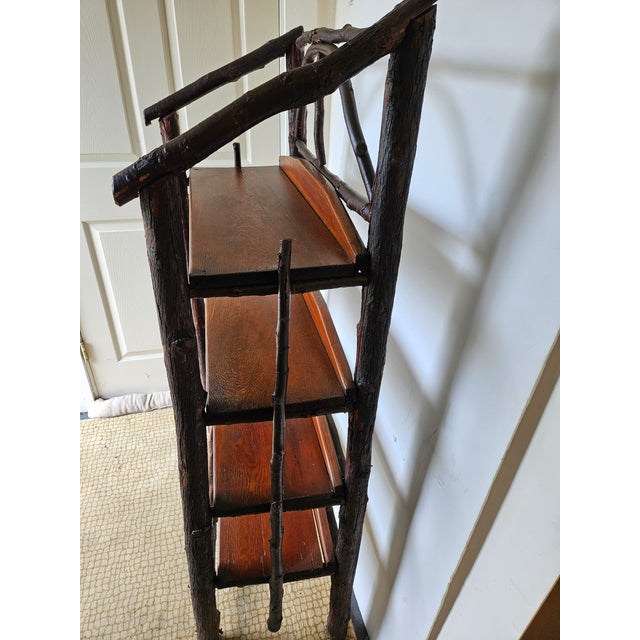 Handsome 1920s Rustic Bookcase probably made in the Adirondacks for a camp. Shelves are 10.5 deep and 25" wide. 8.75"...