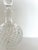 This crystal decanter is in fantastic condition. It would be a great addition to elevate any tablescape.