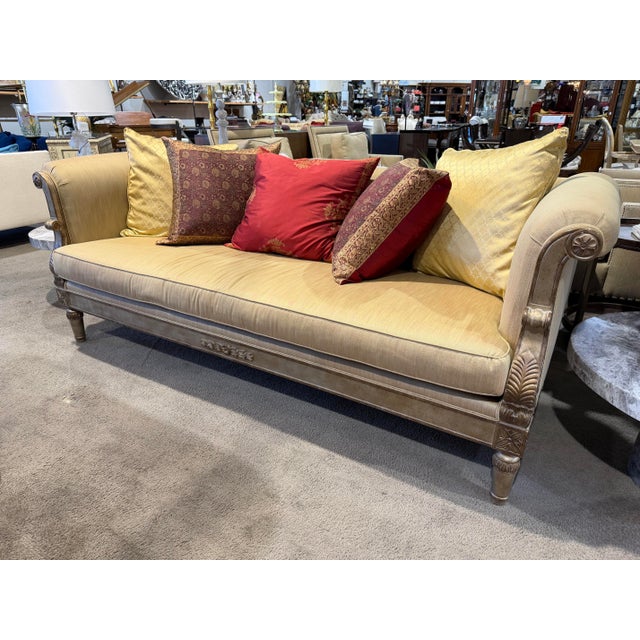 Evoking the grandeur of classical European design, this Empire-style sofa offers a striking blend of regal elegance and...