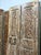 Bring timeless character and artisanal craftsmanship into your home with this stunning pair of vintage hand-carved closet...