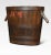 Oval-shaped log bin the oak frame encased in iron bands having stylised handles. Dimensions Height 22 Inches Width 35...