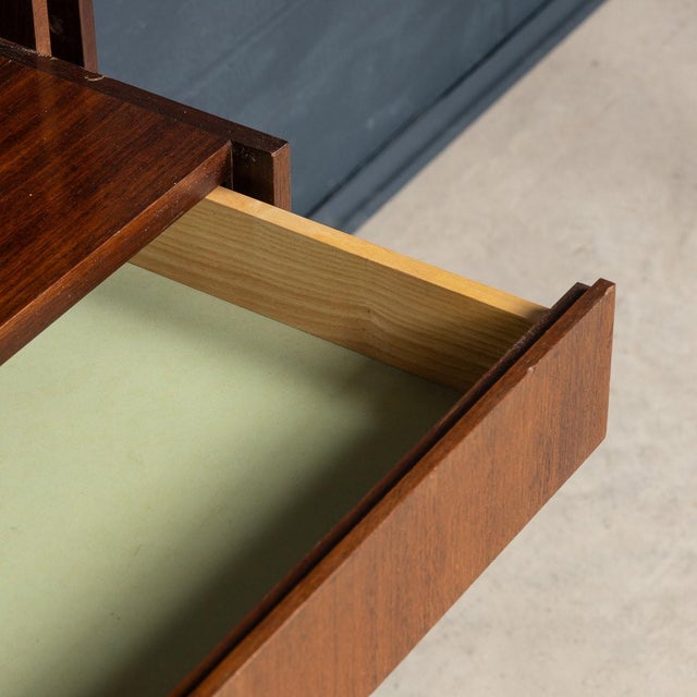 A mid-20th century bookcase or room divider produced in the 1960s by arform, designed by paolo tilche. Featuring wooden...