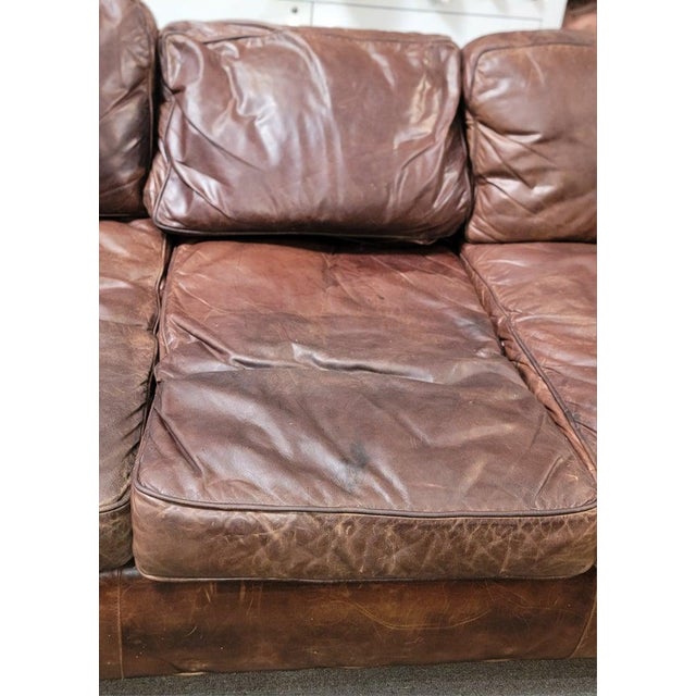 This fine Italian leather sofa is made by or probably a old " Restoration Hardware "sofa.This fine old sofa has minor wear...
