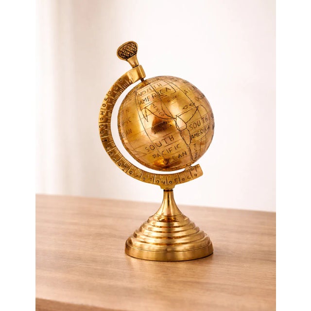 With its prominent axis and beautifully antiqued olive hue, this old-world style globe is more than just a decorative...