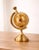 With its prominent axis and beautifully antiqued olive hue, this old-world style globe is more than just a decorative...