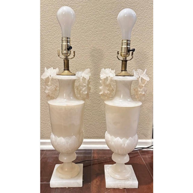 Large Pair of Hand-Carved French Alabaster Neoclassical Urn Table Lamps, circa 1920s An exceptional and highly decorative...
