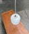 Space Age pendant lamp by the renowned manufacturer Staff, designed by Arnold Berges in the 1970s. The simple lamp body is...