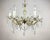 Chic crystal chandelier with gold metal frame for 6 horns. richly decorated with decorative elements and pendants made of...