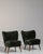 A black wood, Mid-Century Modern-style armchair, dating to the 1940s and made in Denmark. The wood frame is finished in...