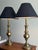 A stately matched pair of vintage Stiffel brass table lamps with sculptural baluster-form bodies, stepped circular bases,...