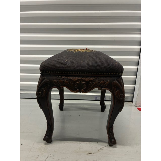 Late 19th early / 20th century mahogany stool with ornately carved cabriole legs, and apron consistent with Victorian or...