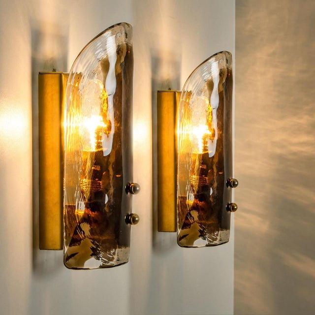 High-end wall sconces made of blown clear and opal murano glass on a brass hardware. Designed and produced by j.t. Kalmar,...