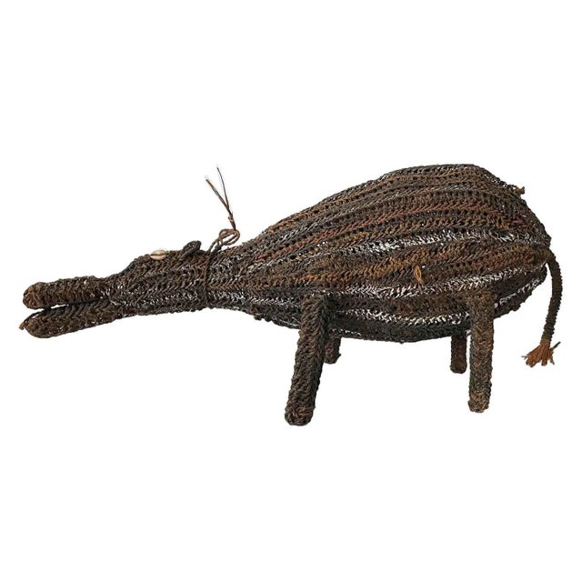 Vintage hand made armadillo. Composed of hand woven twine, painted, New Guinea tribal, folk artist