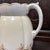 This beautiful vintage English jug or pitcher is a timeless creation by John Maddock & Sons. With a maker’s mark on the...