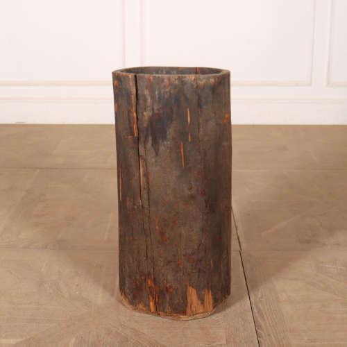 Unusual early 20th century dug out tree trunk from the Carpathian Mountains with its original bark finish. This would make...