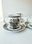 An elegant set of three espresso cups and matching saucers, produced by the historic English manufacturer Wood & Sons,...