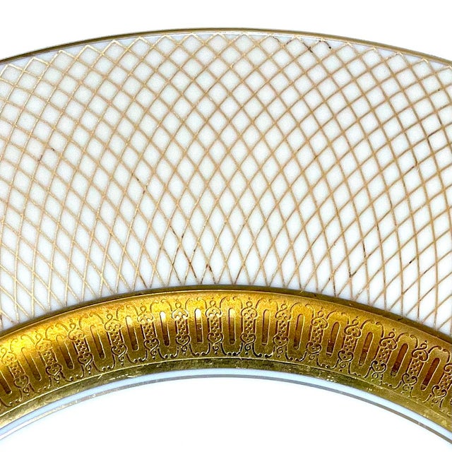 Beautiful 1960's 24 carat gold encrusted and decorated fine porcelain dinnerware set in the "Golden Grail" pattern by...