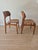 Elegant pair of original Erik Buch model OD49 dining chairs crafted in solid teak in Denmark during the 1960s. The design...