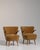 A yellow wood, Mid-Century Modern-style armchair, dating to the 1940s and made in Denmark. The wood frame is finished in...