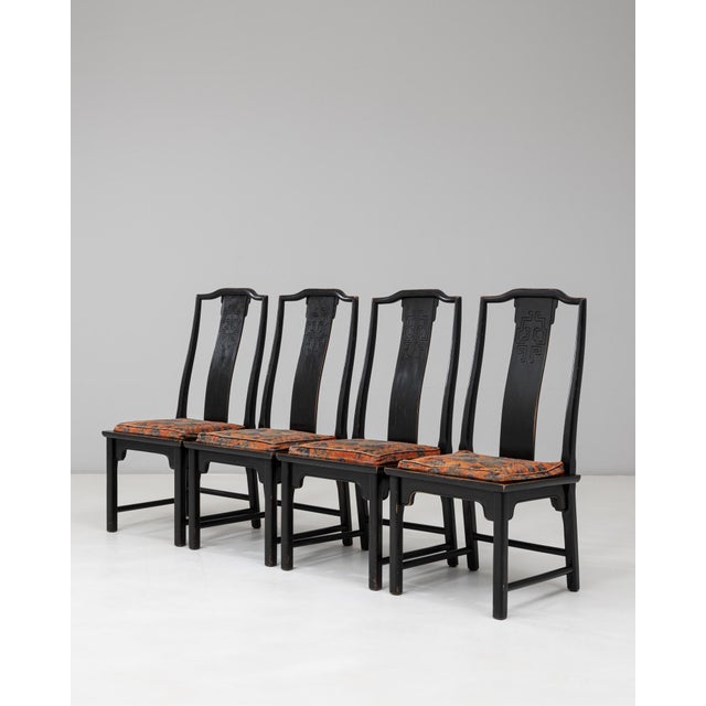 This set of four 20th-century Chinese dining chairs by Anderson & Daishi exemplifies the harmony between traditional...