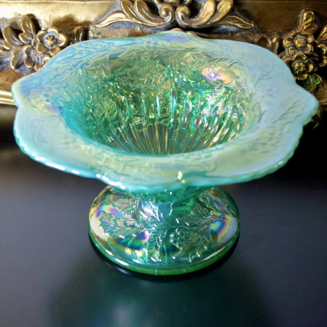 Limited edition Fenton glass Christmas compote in uranium green opal glass, featuring a soft UV-reactive glow and...