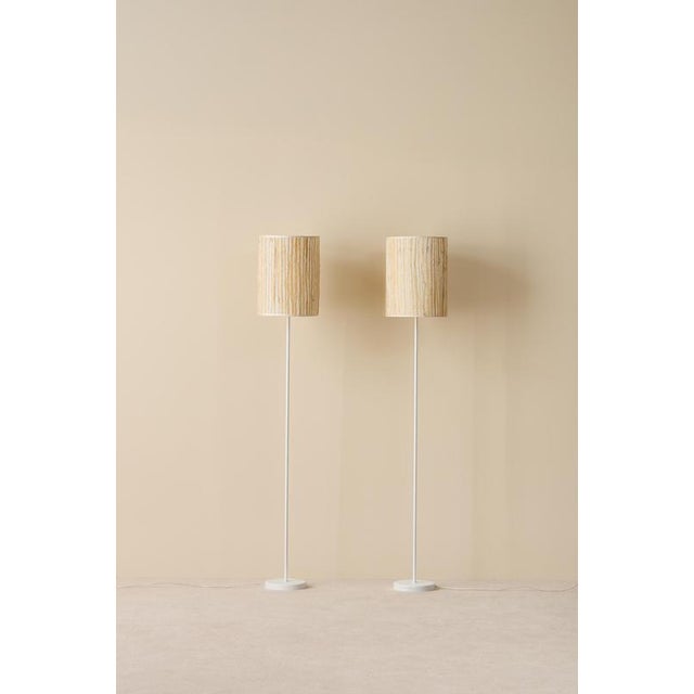 Beautiful pair of floor lamps produced in Sweden, 1960s. White lacquered metal, original screens. Up to 250V (Europe/UK...