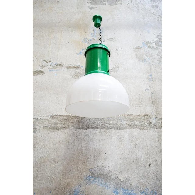 Hanging light with metal structure and acrylic glass lampshade. Industrial style. Italian production 70s Up to 250V...