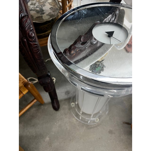 Up for consideration is a beautiful vintage lucite light up side table with a signed clock table top. This would look...