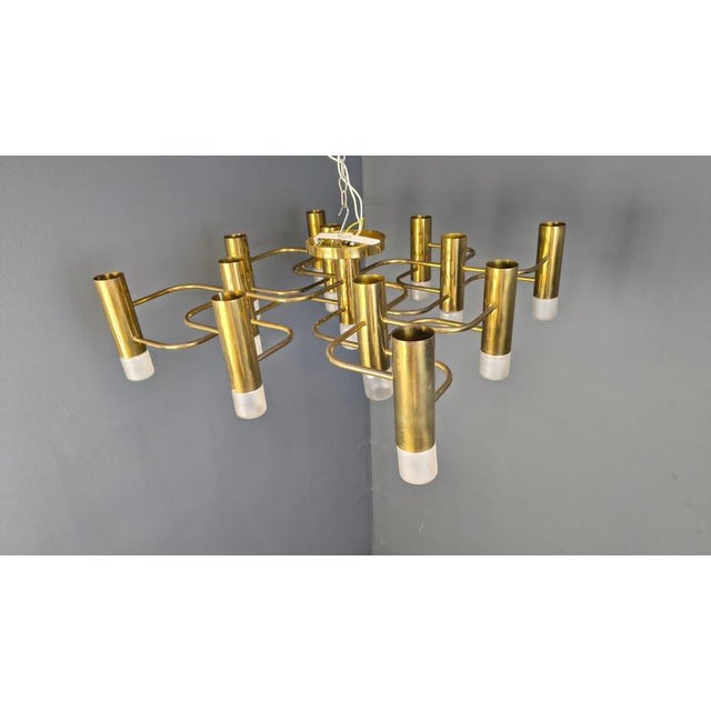 Mid century Gaetano Sciolari chandelier with 13 lightpoints The chandelier is in very good condition and in full working...