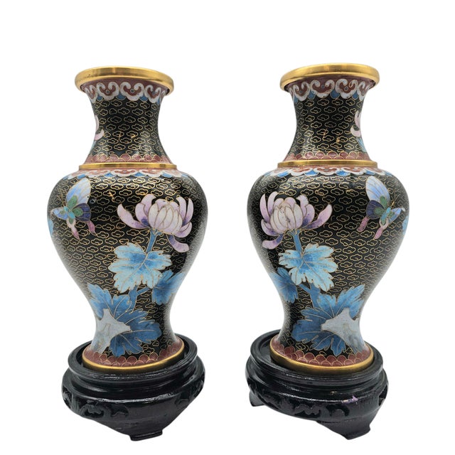 This matched pair of Chinese cloisonné enamel vases was produced by Jingfa, a leading Beijing-based manufacturer...