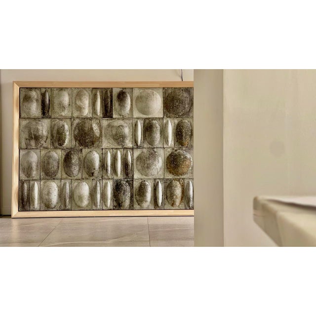 Vintage sculptural cement wall panel — modular composition of 52 elements a striking and immediately captivating piece....