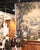 Graceful and highly decorative, this antique floral chandelier combines delicate porcelain blossoms with an airy scrolling...
