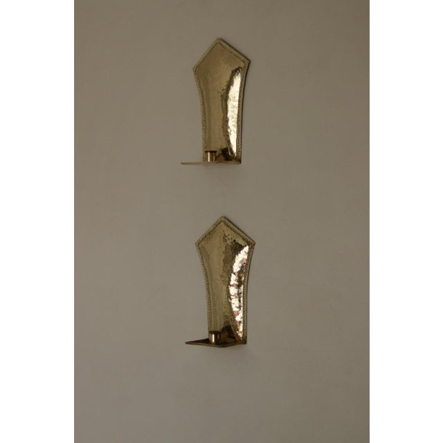 Stunning pair of Swedish brass sconces, featuring beautiful detailing. Both sconces are in very good vintage condition...