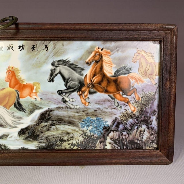 This framed artwork features a large, hand-painted porcelain tile depicting the famous traditional Chinese motif of the...