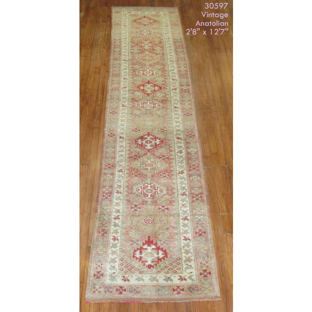 One of a kind, mid 20th-century Hand-knotted Turkish Anatolian Runner in a neutral palette. Professionally Washed &...