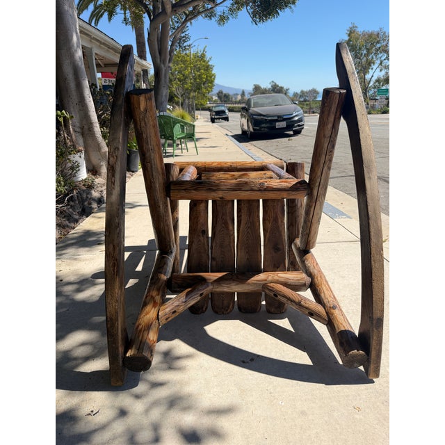 Monumental Early 20thc hand Made Pine Log Rocking Chair. Pine log and pine split log with wonderful construction. Strong...