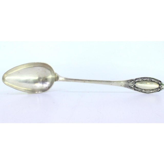 Silver Rice and Serving Spoon with Reliefs, in Very Good conditions. Designed 1890 to 1919 This piece has an attribution...