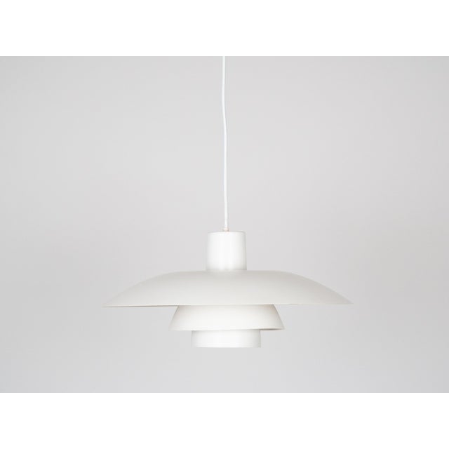 The ph 4/3 lamp is an absolute classic, designed by the renowned danish designer and architect poul henningsen. It has...