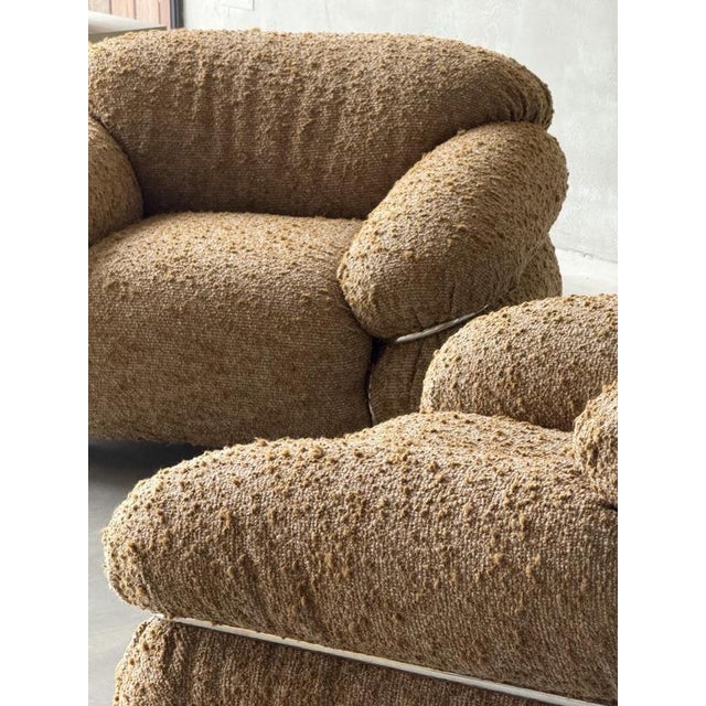 A Pair of super comfy 'Sesann' Armchairs by Gianfranco Fratinni, circa 1970. Now re-upholstered in quality bouclé fabric,...