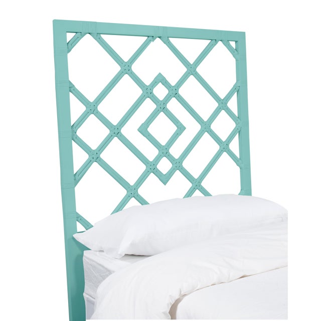 This headboard features classic Rattan design in a geometric pattern. Constructed of solid rattan and hand bound with...