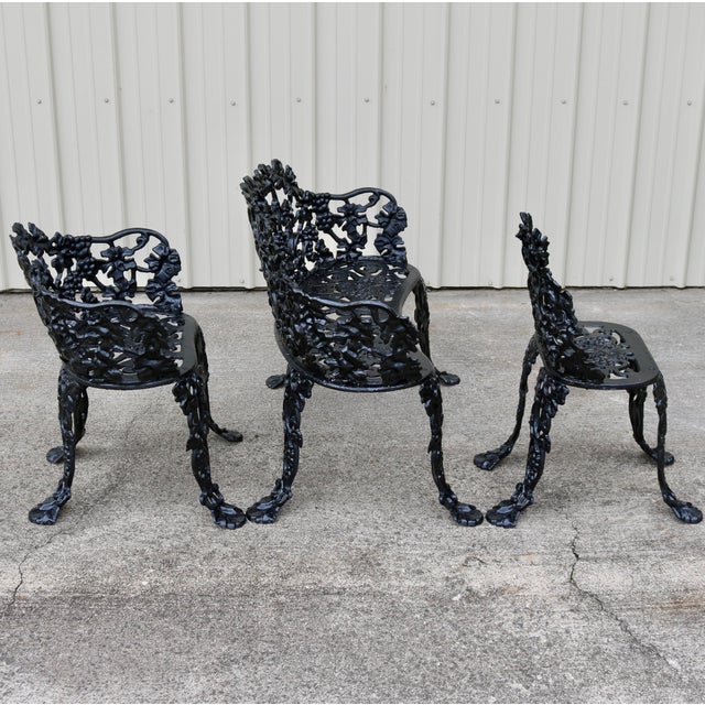 Elevate your garden, patio, or conservatory with this striking 3-piece vintage Victorian Revival outdoor seating set....