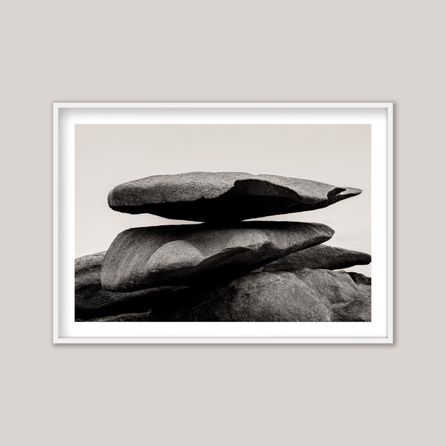Abstract Balance—a sepia-toned black and white photograph capturing the extraordinary rock formations of the Côte de...