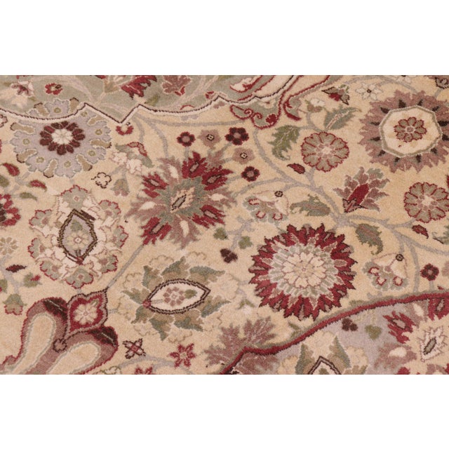 Designed with mesmerizing intricacy and gorgeous color palette, this hand-knotted masterpiece demonstrates the beauty and...
