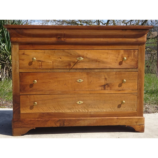 Very old, restored walnut chest of drawers. A Louis Philippe style piece, circa 1850, with understated elegance and simple...