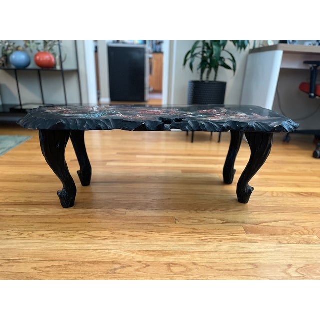 An exceptional, highly collectible vintage Showa-period Japanese black lacquer coffee table. This striking piece elevates...