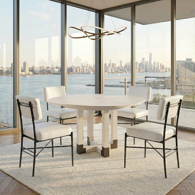 Bold pedestal geometry and a radial veneer pattern combine Art Deco and mid-century influences in a compact, expandable...