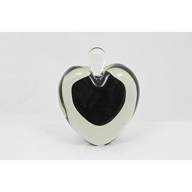 Mid-century Italian Murano art glass perfume bottle. Featuring black cased glass center. No maker's mark.